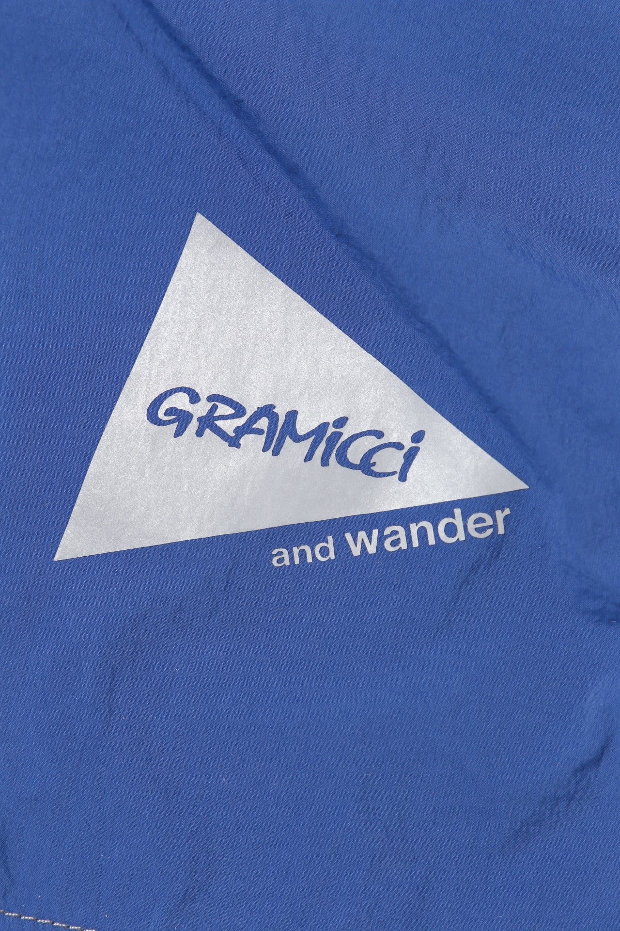 【and wander】GRAMICCI × and wander brushed nylon jacket(5745121506)