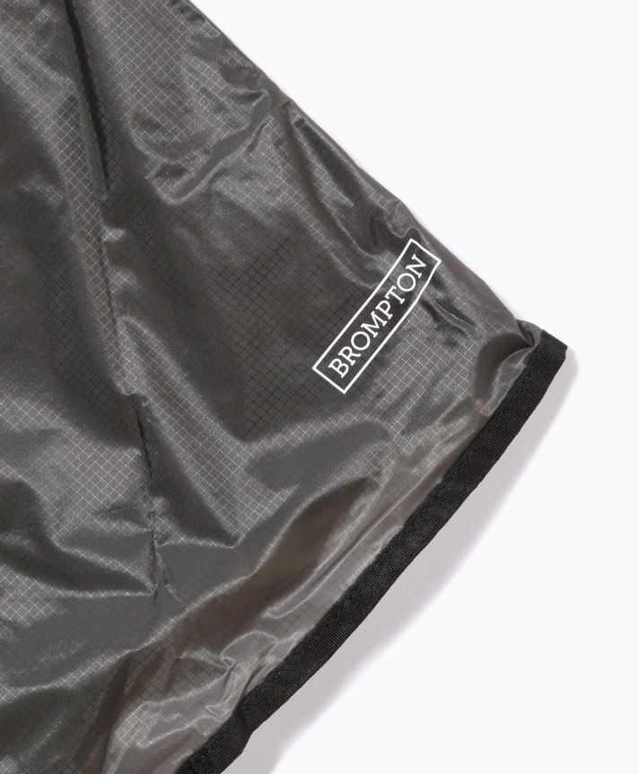 【and wander】 Brompton × sil poncho