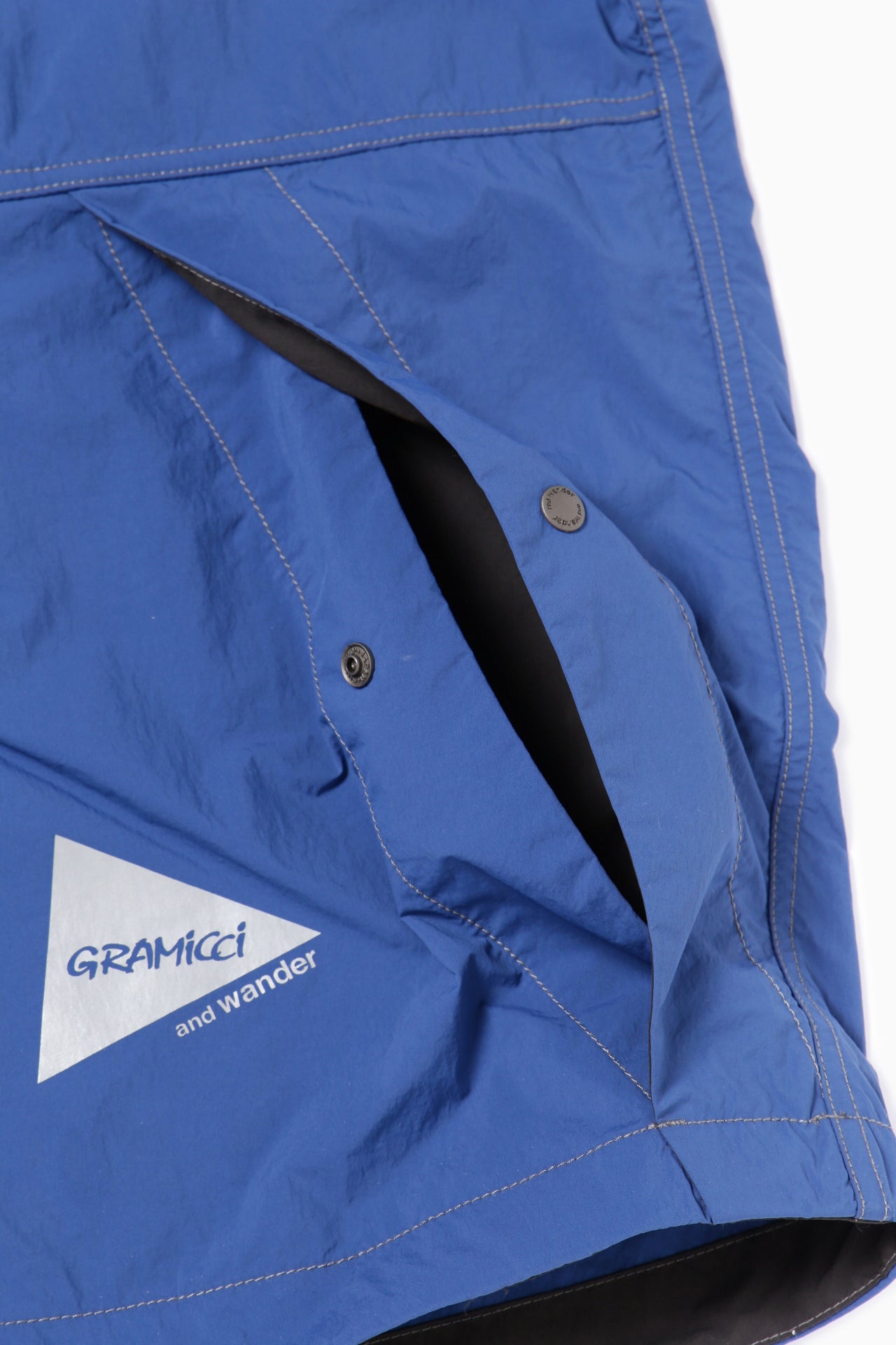 【and wander】GRAMICCI × and wander brushed nylon jacket(5745121506)