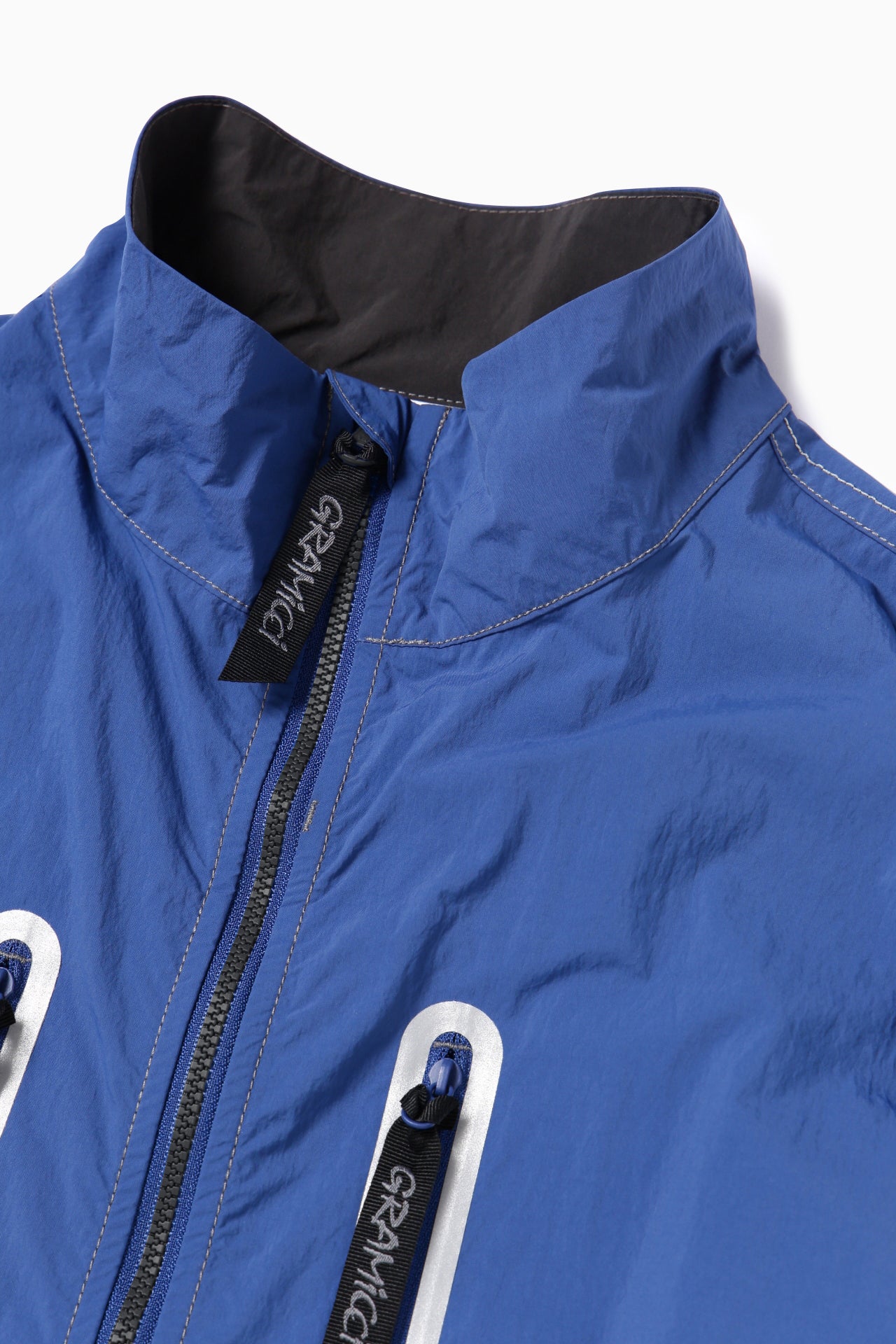 【and wander】GRAMICCI × and wander brushed nylon vest(5745121507)